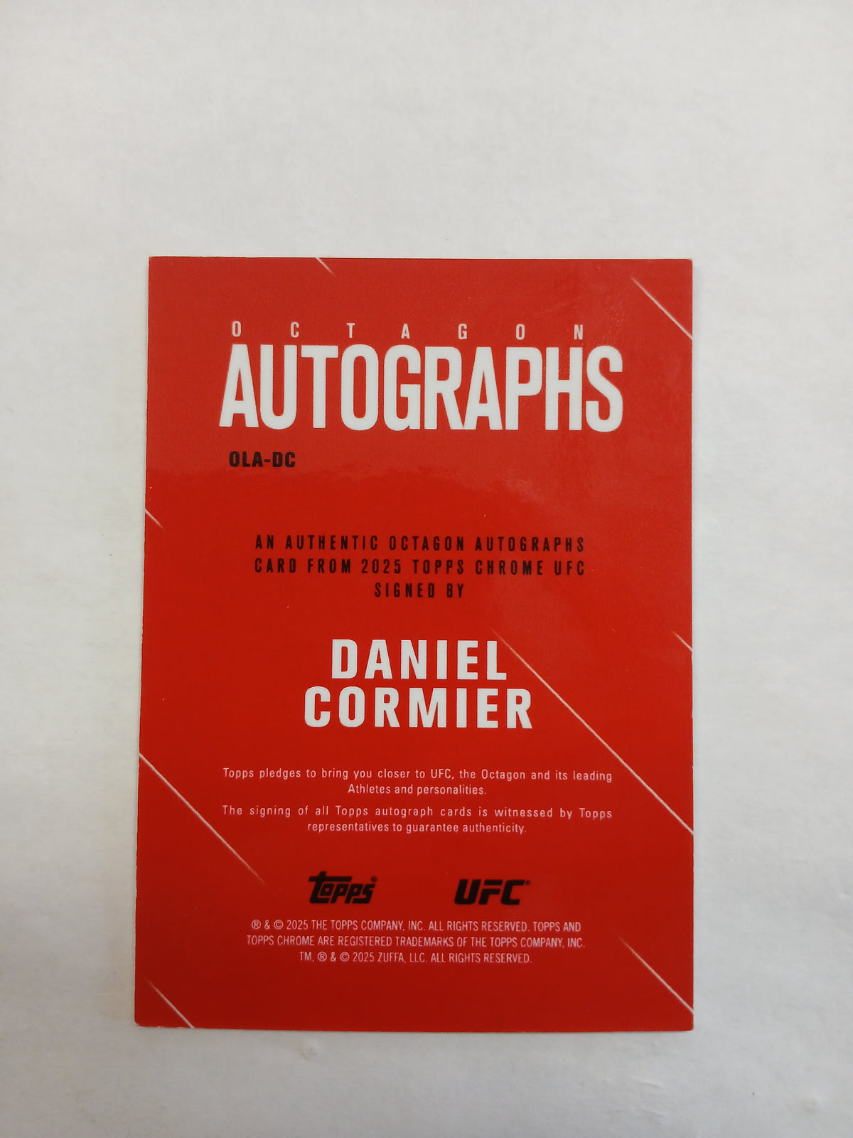 2025 Topps Chrome UFC Daniel Cormier Octagon Autographs Orange Geometric Refractor On Card Auto #25/25