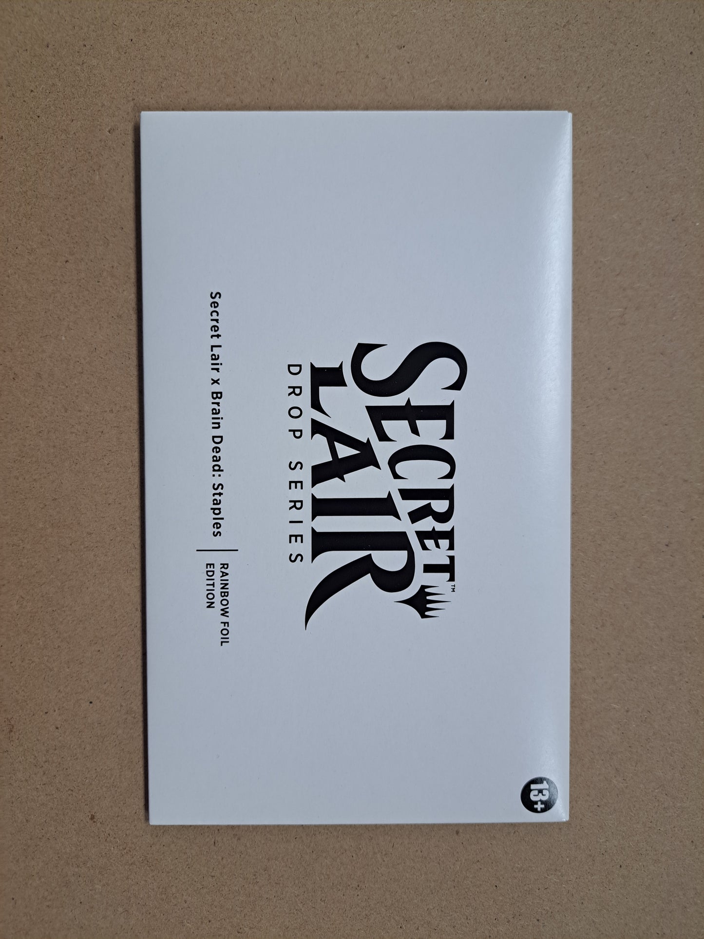 Secret Lair x Brain Dead: Staples Rainbow Foil Mtg