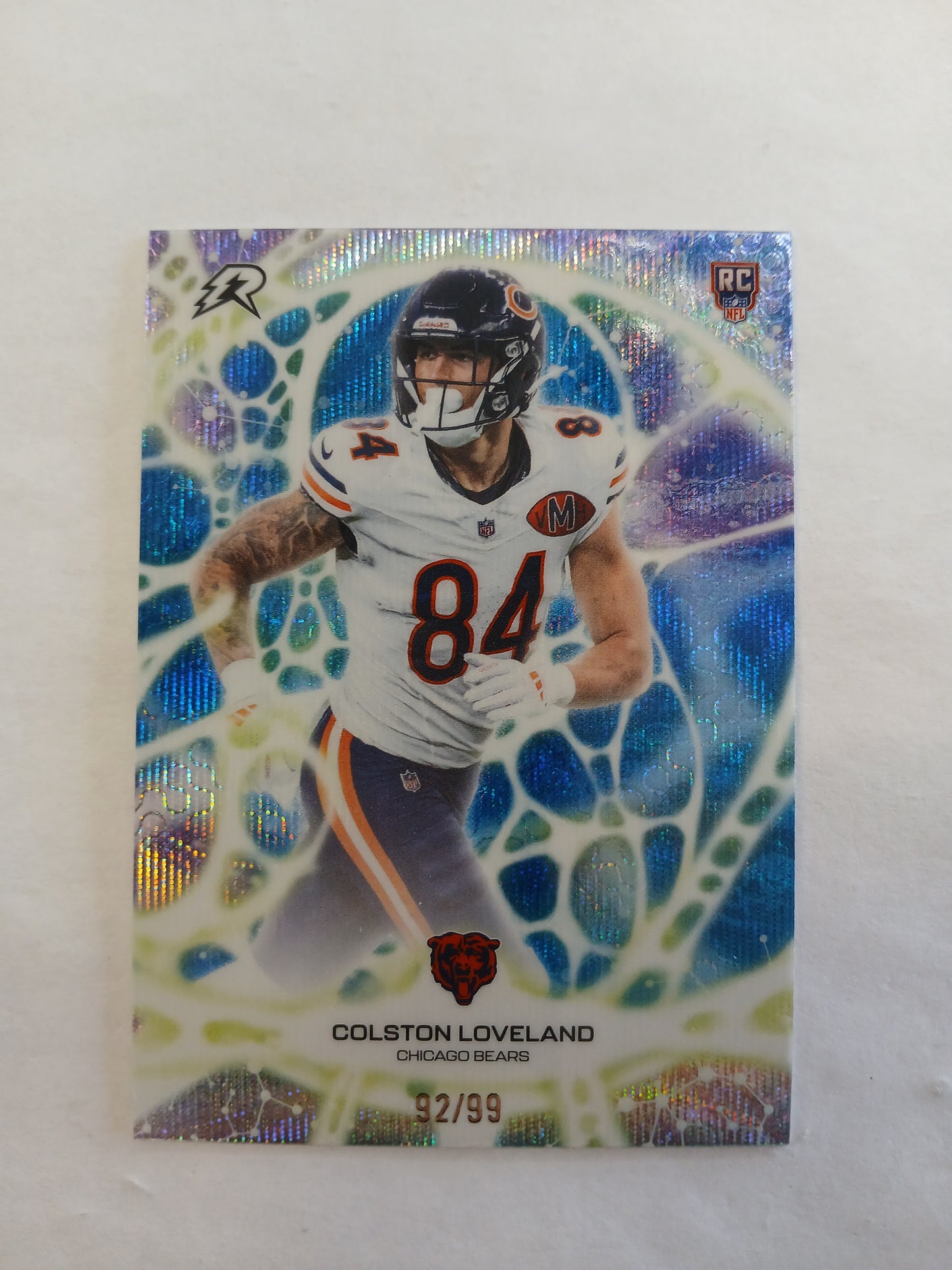 2026 Topps Resurgence Colston Loveland Protonyx Rookie Blue Wave #/99