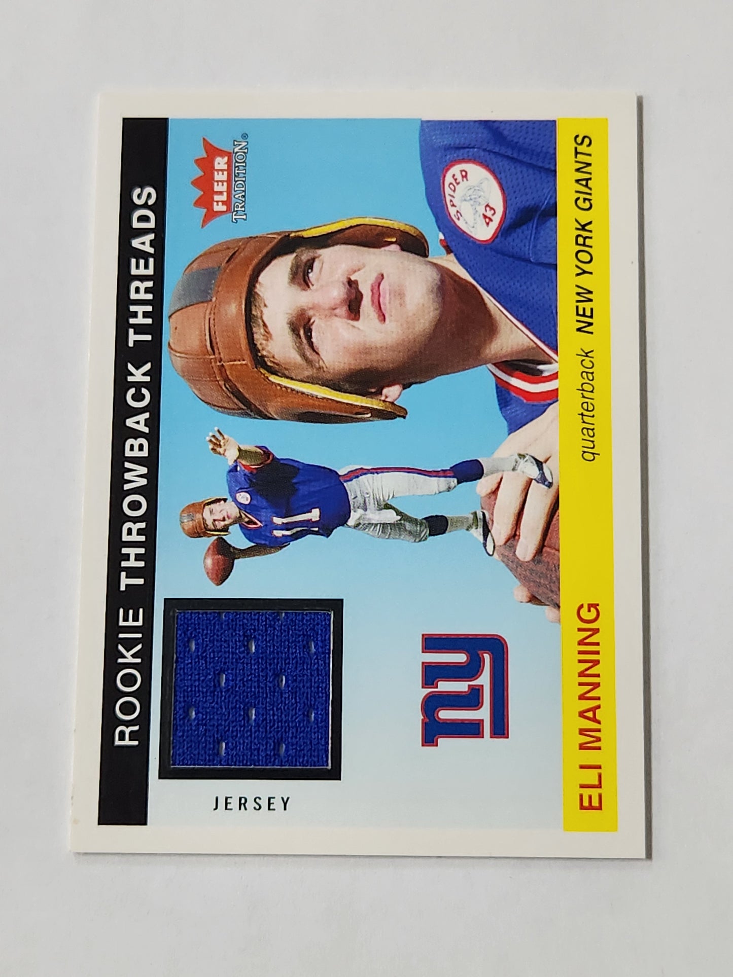 2004 Fleer Tradition Eli Manning Rookie Throwback Threads Jersey Card